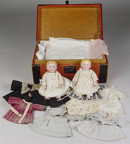 Appraisal: German Pair of All-Bisque Babies with Trunk Clothing Blue painted