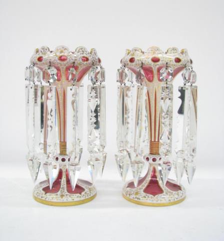 Appraisal: A pair of Victorian cranberry case glass lustres with gold