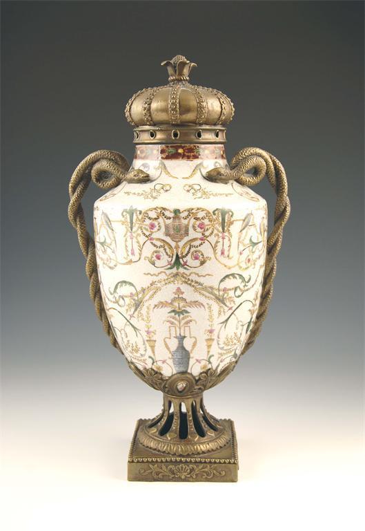 Appraisal: An earthenware and brass mounted vase