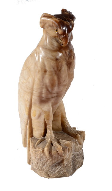 Appraisal: A MARBLE SCULPTURE CARVED IN THE FORM OF A HAWK