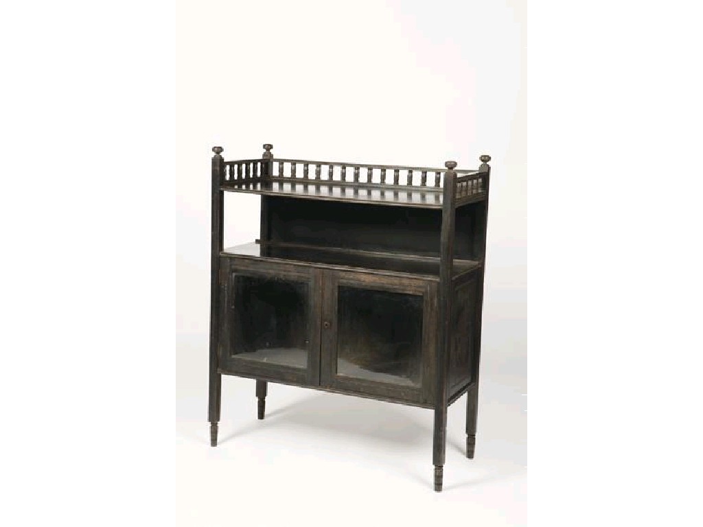 Appraisal: AN EBONISED AESTHETIC PERIOD DISPLAY CABINET the rectangular top with