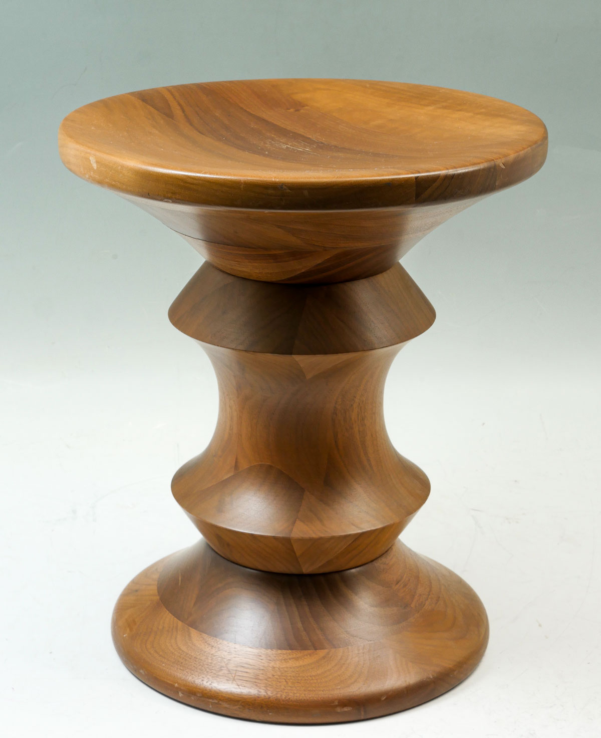 Appraisal: MID-CENTURY MODERN EAMES WALNUT STOOL Designed by Charles Ray Eames