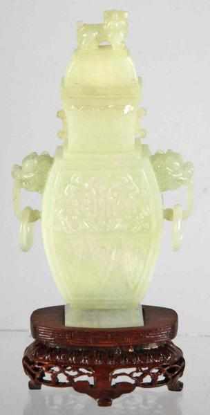 Appraisal: Carved Jade Lidded Jar Description Very detailed carvings Includes wooden