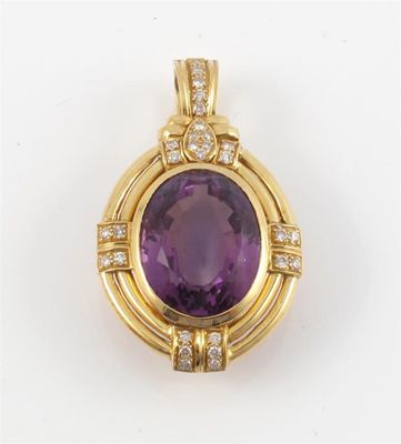 Appraisal: An amethyst and diamond set pendant The large oval shaped