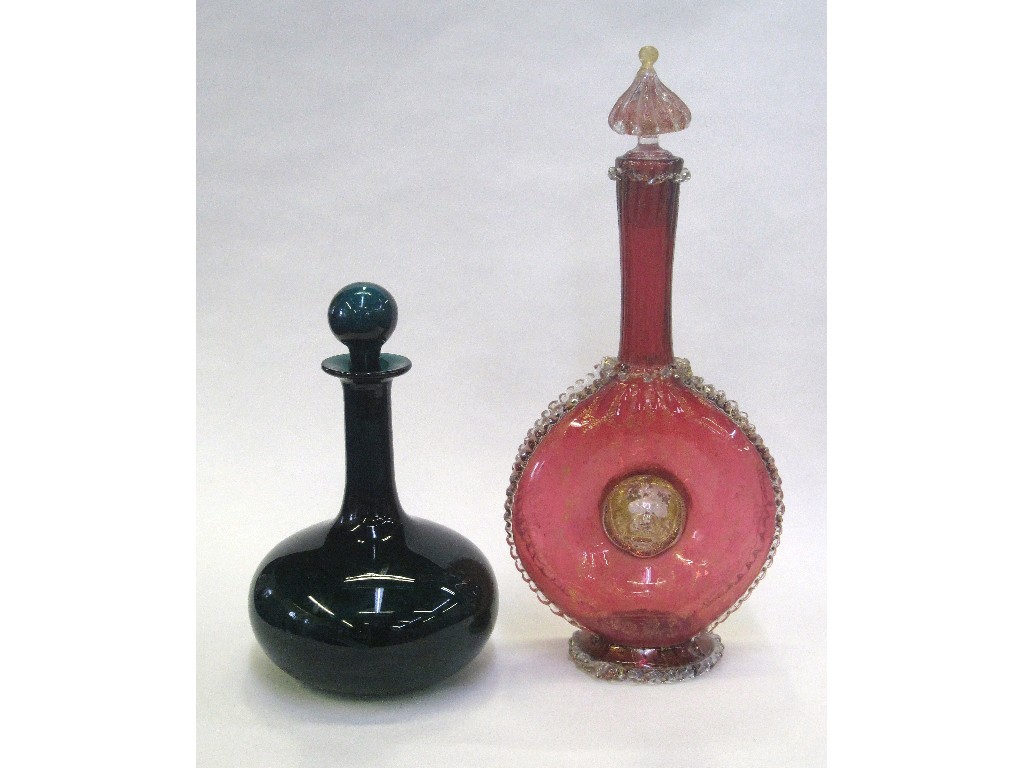 Appraisal: Cranberry and aventurine glass decanter and a green glass decanter