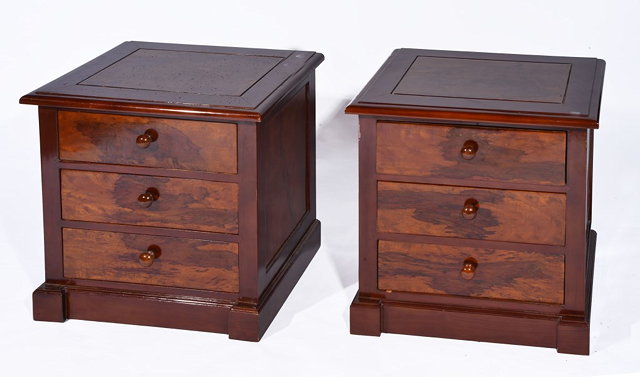 Appraisal: A PAIR OF MAHOGANY AND ROSEWOOD VENEERED BEDSIDE CHESTS each