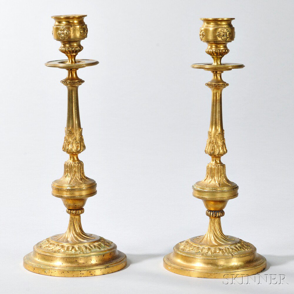 Appraisal: Pair of Gilt-bronze Candlesticks France th century floret-banded nozzles with