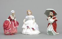 Appraisal: Lot of Three Royal Doulton Figurines Lot includes three female