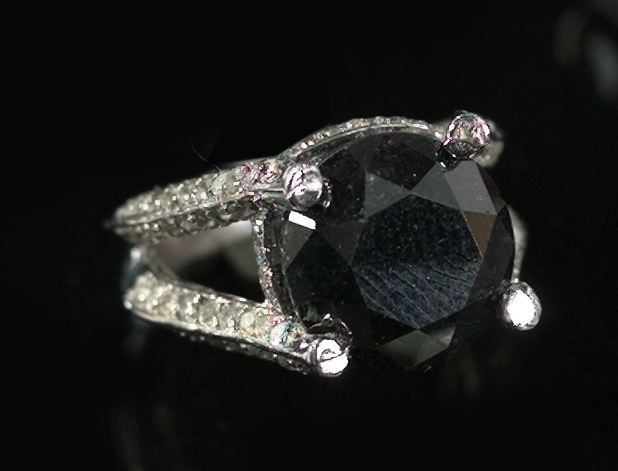 Appraisal: Fourteen-Karat White Gold and Black and White Diamond Dinner Ring