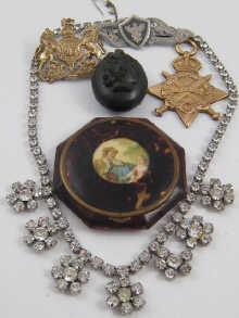 Appraisal: A mixed lot comprising a tortoiseshell compact a jet locket