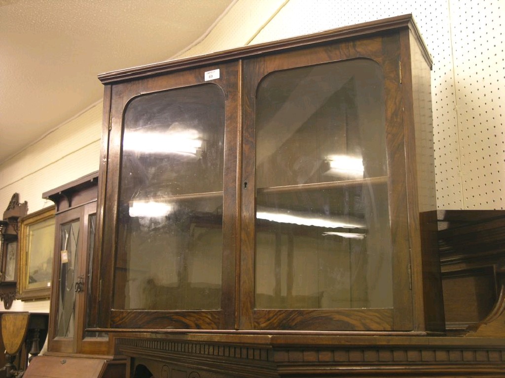 Appraisal: A Victorian walnut side cabinet pair of burr veneered doors