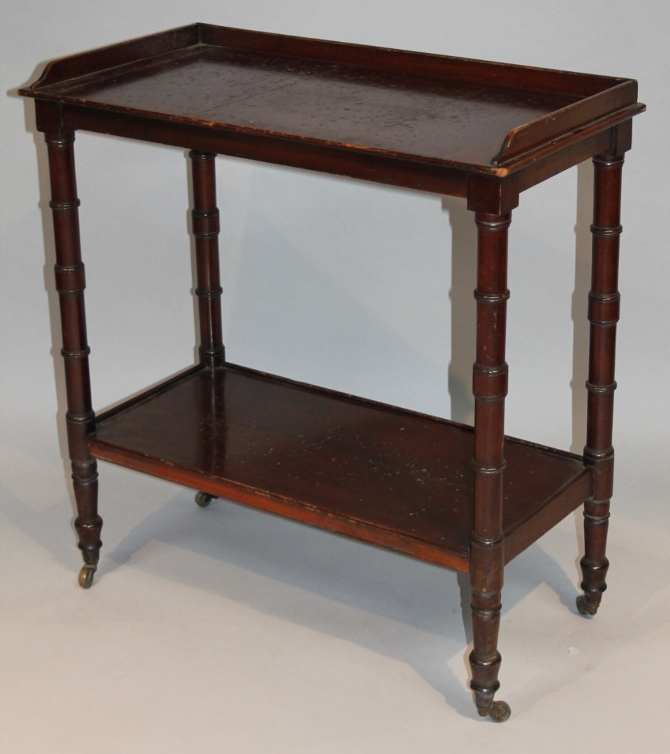 Appraisal: A late thC mahogany two tier buffet the upper section