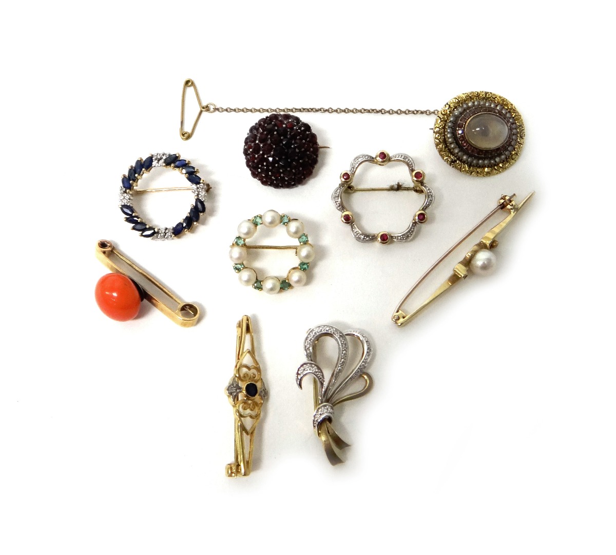 Appraisal: A Bohemian garnet set brooch in a circular design a