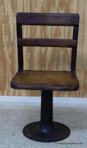 Appraisal: Antique Oak Cast Iron Child's Pedestal ChairThis is a late