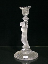 Appraisal: A Baccarat candlestick the stem in the form of a