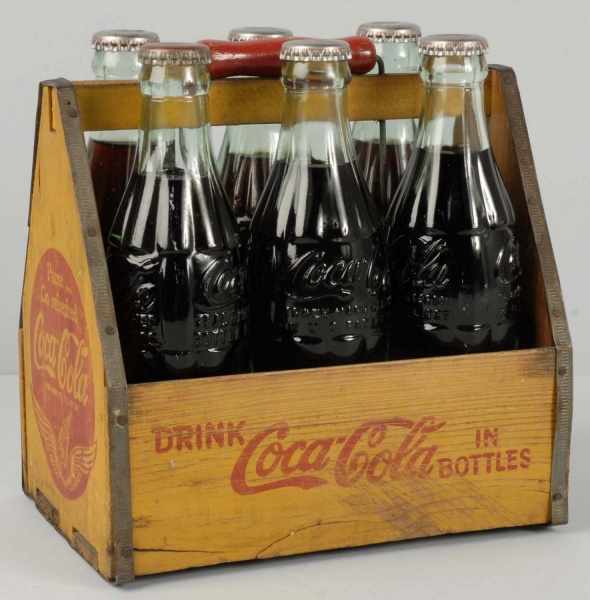 Appraisal: Wooden Coca-Cola Carrier with Full Bottles Description s Strong red