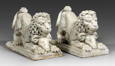 Appraisal: Pair cast stone lions each with crouching lion over a