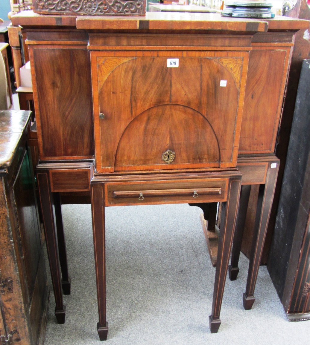 Appraisal: A th century inlaid mahogany breakfront side cabinet on tapering