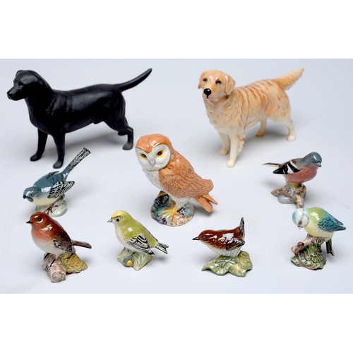 Appraisal: Two Beswick models of dogs and various birds including an