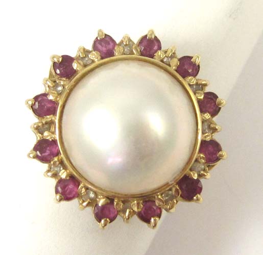 Appraisal: MABE PEARL RUBY AND DIAMOND RING k yellow gold with