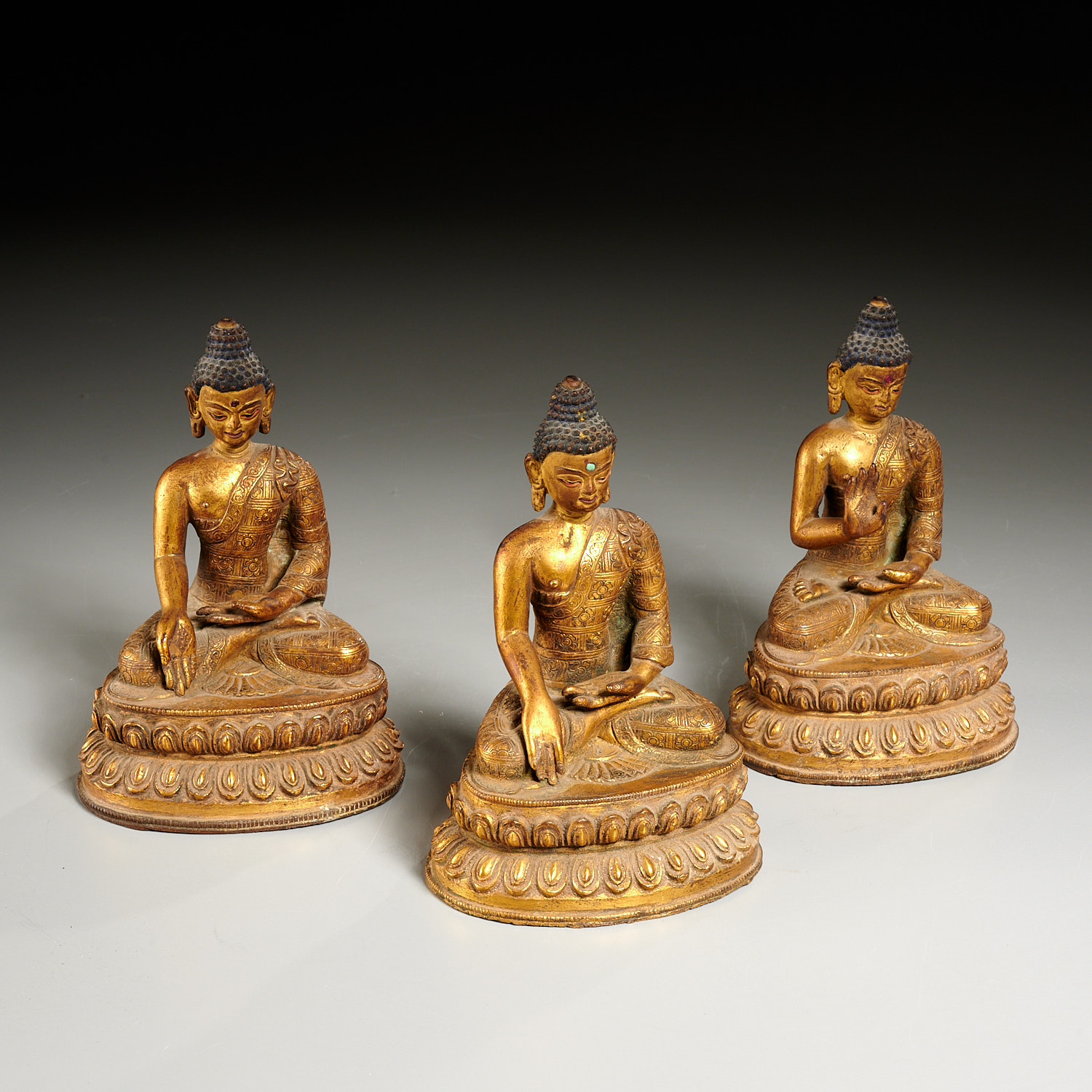 Appraisal: GROUP SINO-TIBETAN BRONZE BUDDHA SAKYAMUNI th c cast gilt bronze