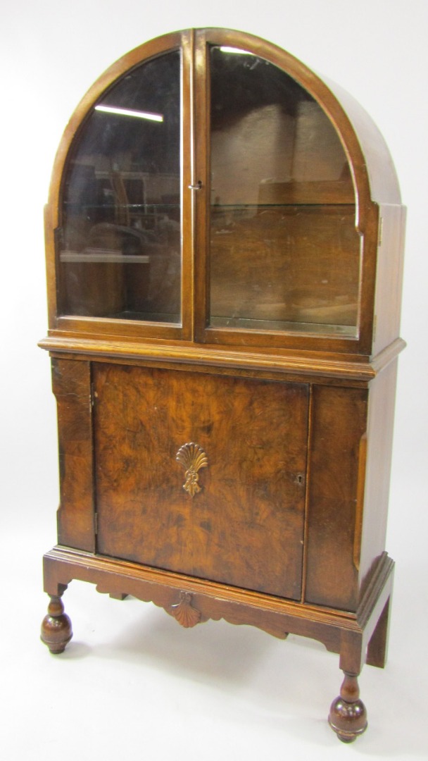 Appraisal: An Art Deco oak and walnut domed display cabinet two