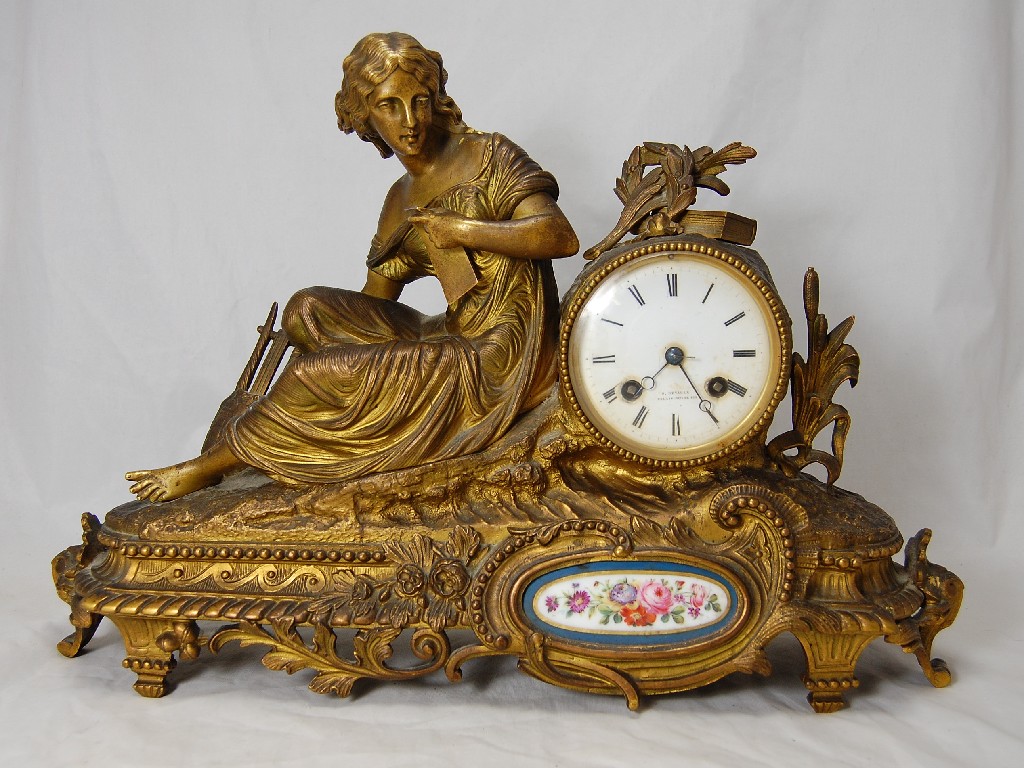 Appraisal: A th century ormolu mantel clock having a drum movement