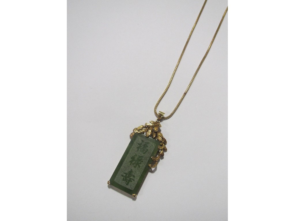 Appraisal: Fourteen carat gold mounted Chinese jade pendant with ct gold