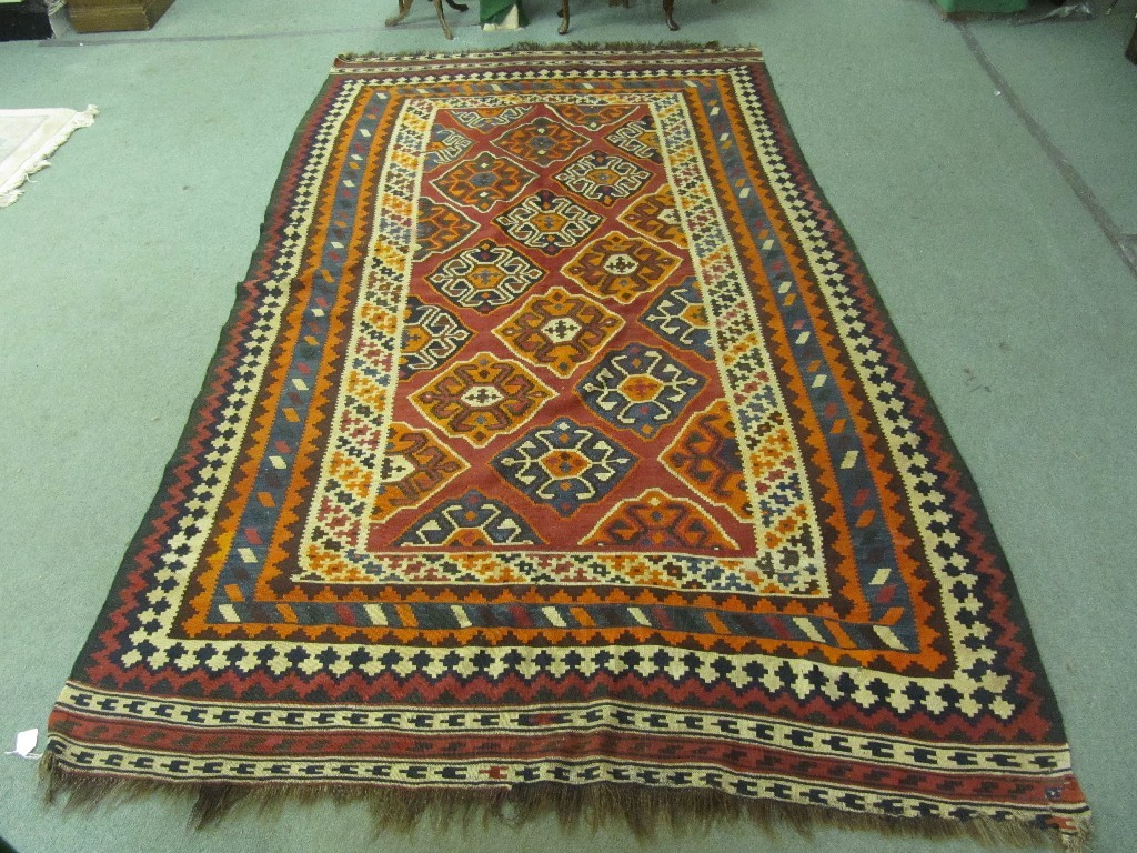 Appraisal: Two Persian multicoloured floor rugs