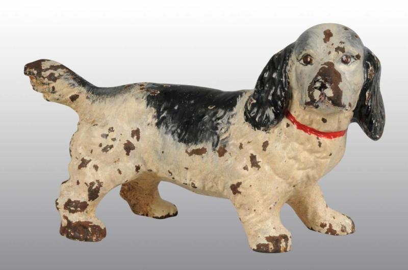 Appraisal: Cast Iron Cocker Spaniel Doorstop Description Made by Hubley cat