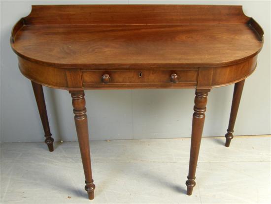 Appraisal: th century mahogany bow fronted side table with raised back