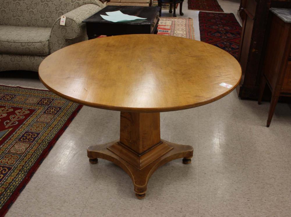 Appraisal: ROUND VICTORIAN MAPLE CENTER TABLE American th century featuring a