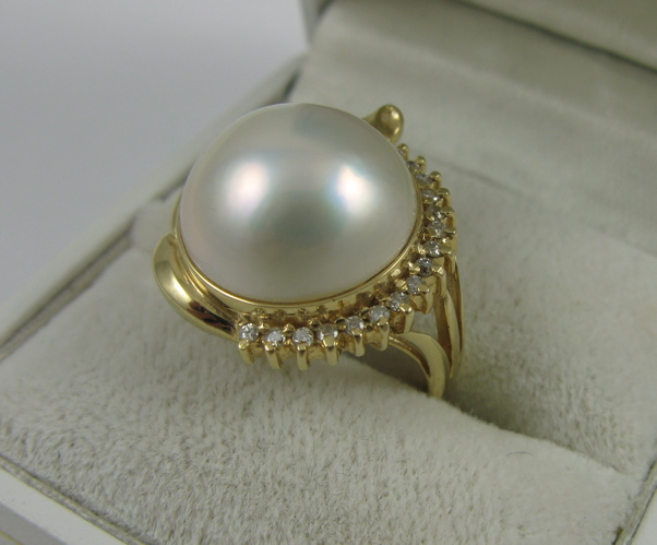 Appraisal: THREE ARTICLES OF MABE' PEARL AND K GOLD JEWELRY including