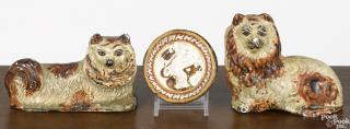 Appraisal: Two Pennsylvania chalkware lions th c together with a small