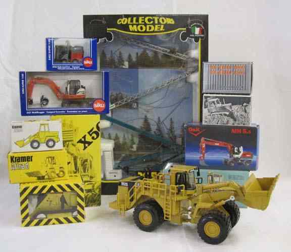 Appraisal: TWELVE DIECAST SCALE MODELS OF HEAVY EQUIPMENT including Norscot Cat