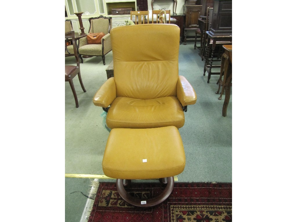 Appraisal: Stressless leather reclining armchair with stool