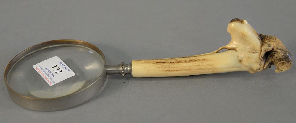 Appraisal: Magnifying glass with stag handle carved with bear on hill