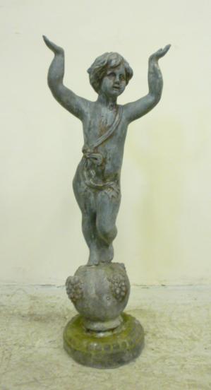 Appraisal: A LEAD FIGURE OF A PUTTO th century modelled standing