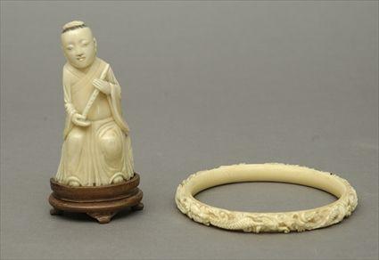 Appraisal: Chinese Dragon-Carved Ivory Bangle Together with a carved ivory figure