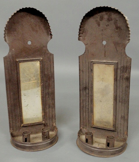 Appraisal: Pair of tin candle wall sconces th c with mirrored