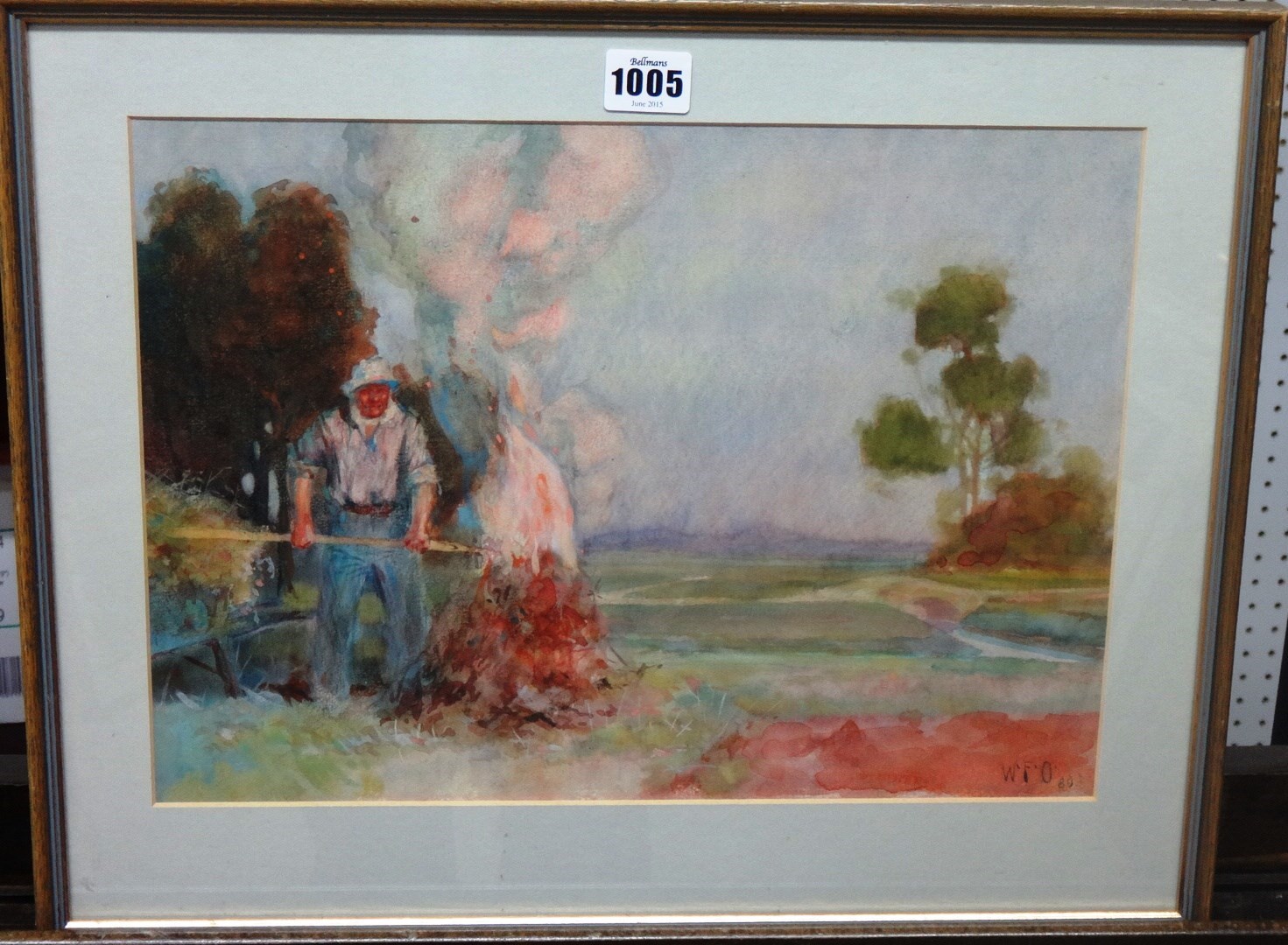 Appraisal: Walter Frederick Osborne - The gardener's bonfire watercolour signed with