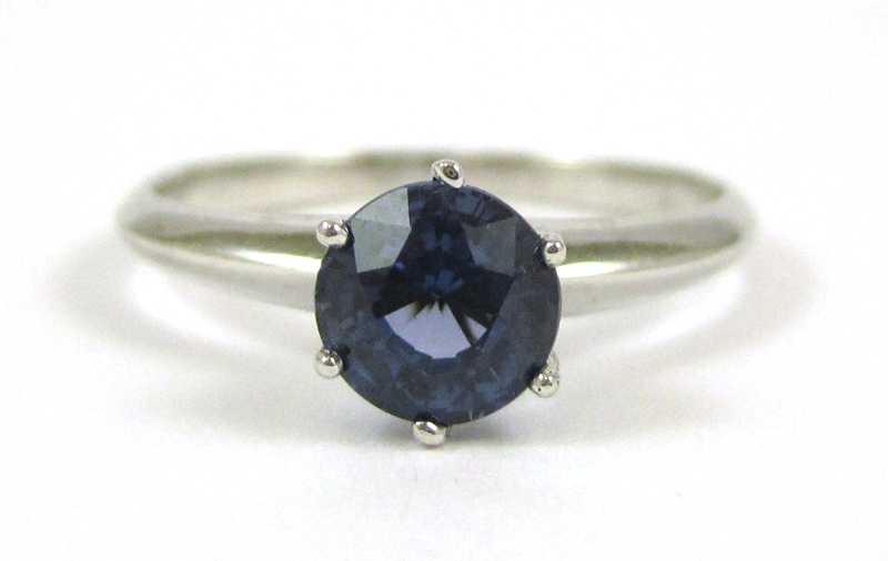 Appraisal: TIFFANY CO SAPPHIRE AND PLATINUM RING set with a single