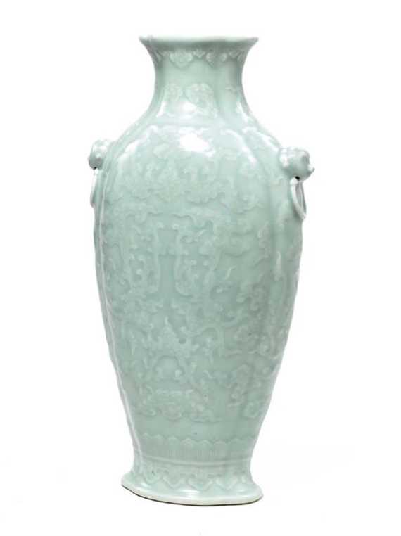 Appraisal: VASE MIT MASKARONS China H cm Flach bauchig und gerippt