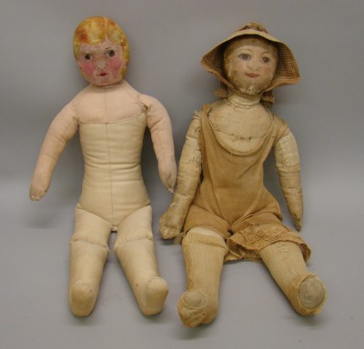 Appraisal: - Hand painted cloth folk art dolls Pair of similar