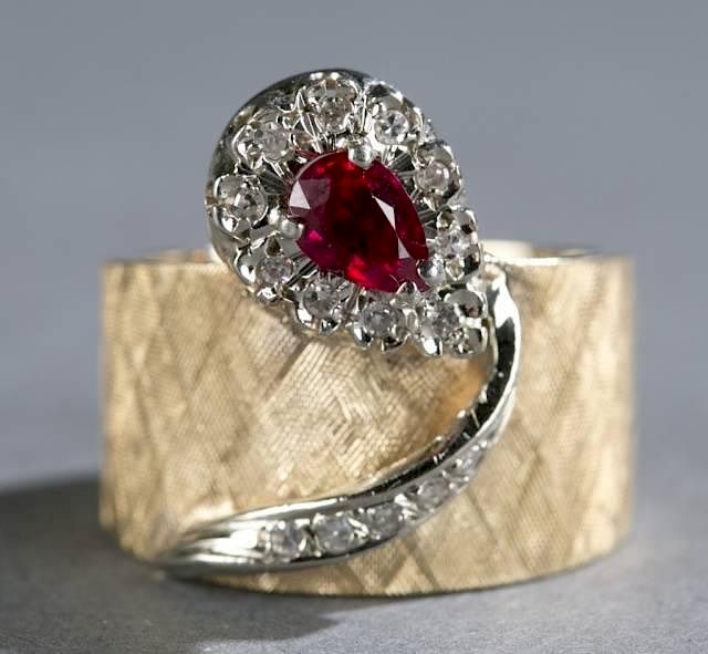 Appraisal: Ruby and diamond kt yellow gold ring A untreated Burma