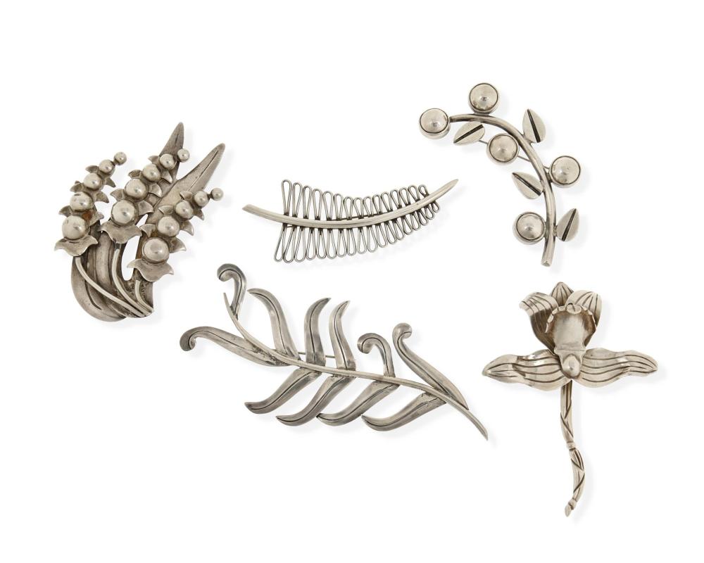 Appraisal: A group of H ctor Aguilar silver floral brooches -