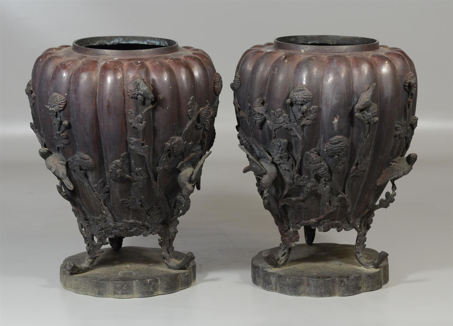 Appraisal: Pair of Japanese bronze footed vases with bird and floral