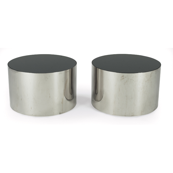 Appraisal: Directional tables pair attribution polished steel cylinders with inset black