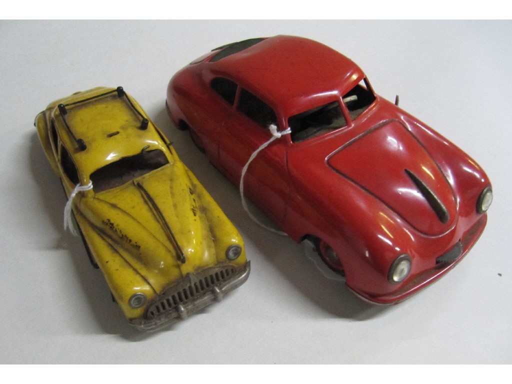 Appraisal: Lot comprising Minic toy car and JNF tinplate Porsche