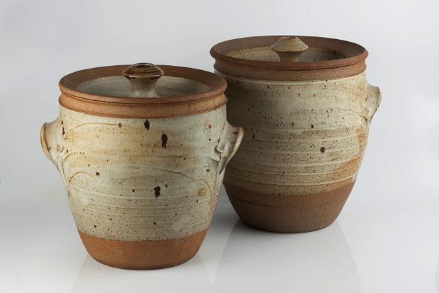 Appraisal: Michael Casson British - Two storage potsoatmeal glazeeach impressed potter's